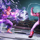 Street Fighter's Akuma has no chill as he shoots a hadouken at Tekken protagonist Jin Kazama.